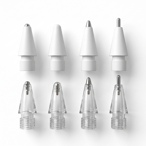 Tips 01 nib families in a grid — white cones and transparent metal-point tips